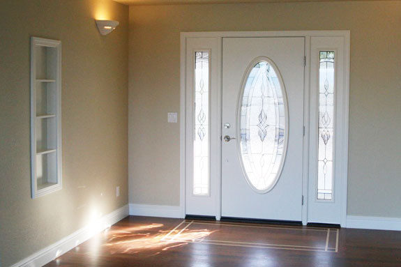 front door from inside with oval glass design