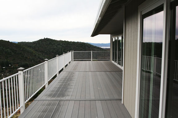view from deck with clear lake in background